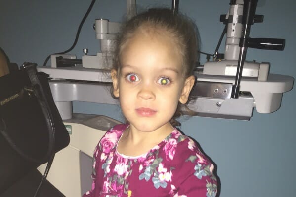 Symptoms Of Eye Cancer In Child Seen A White Glow In A Photo