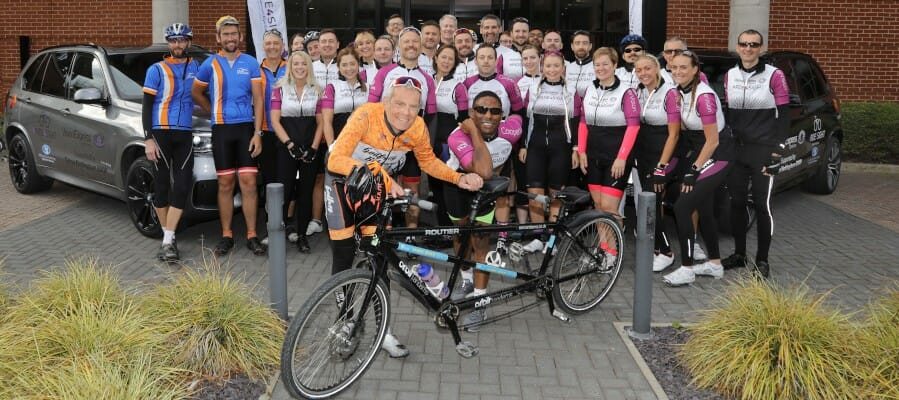 Photo of the cyclists outside Vision Express HQ