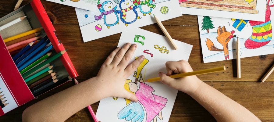 stock photo of a child drawing Christmas pictures