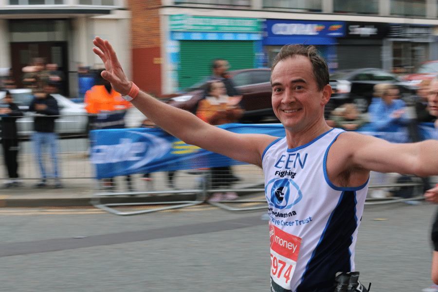 Ben Revill running past the cheer point during the virgin london marathon