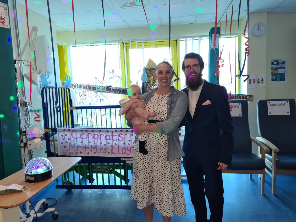 Imogen lloyd and parents' at the hospital with wedding decorations