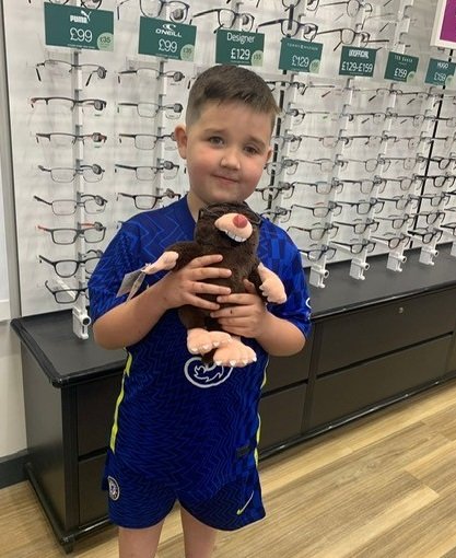 Logan Brown with his marvin the mole teddy