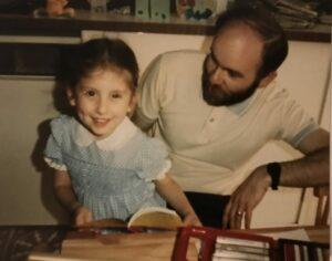 a young emily with her dad