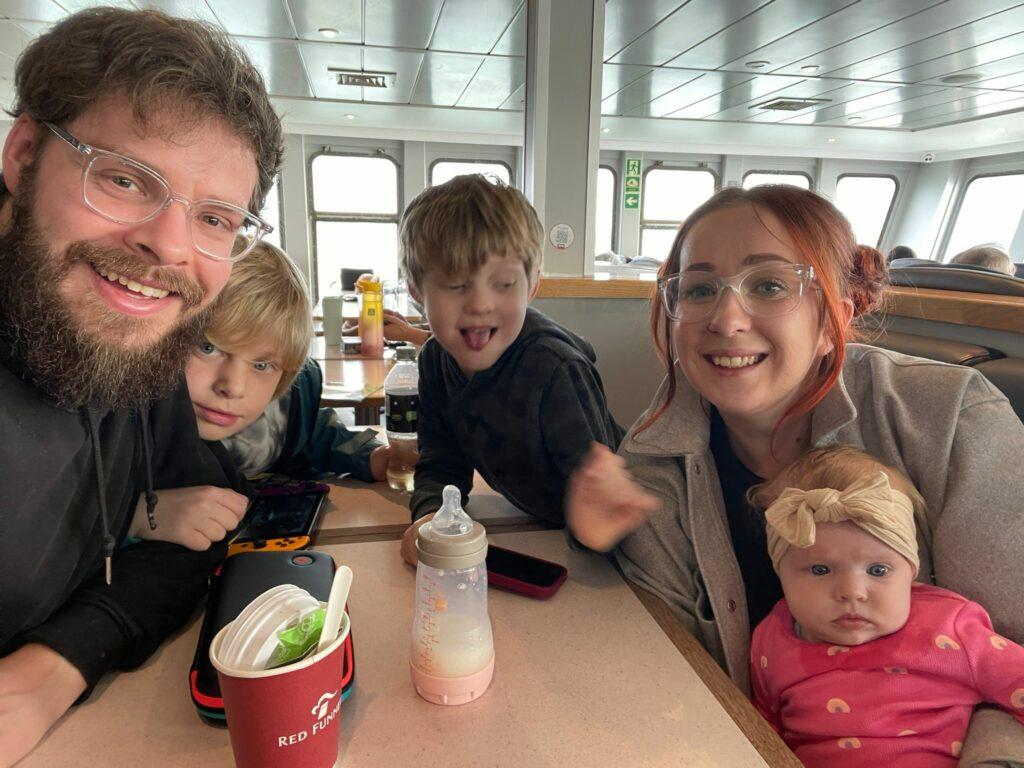Arlo with his parents and siblings