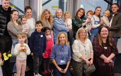 group picture of chect staff and members at leicester space centre for a family meet-up