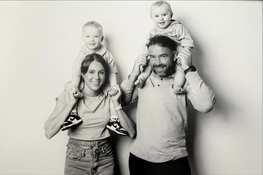 Kooper with his mum, dad and brother