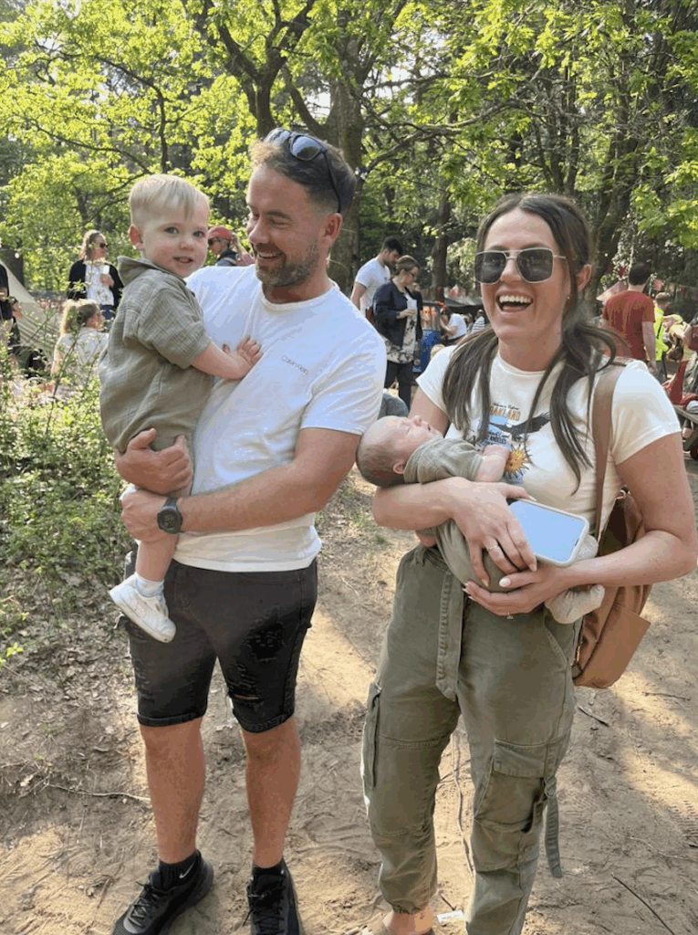 The family together on an outing, smiling and laughing