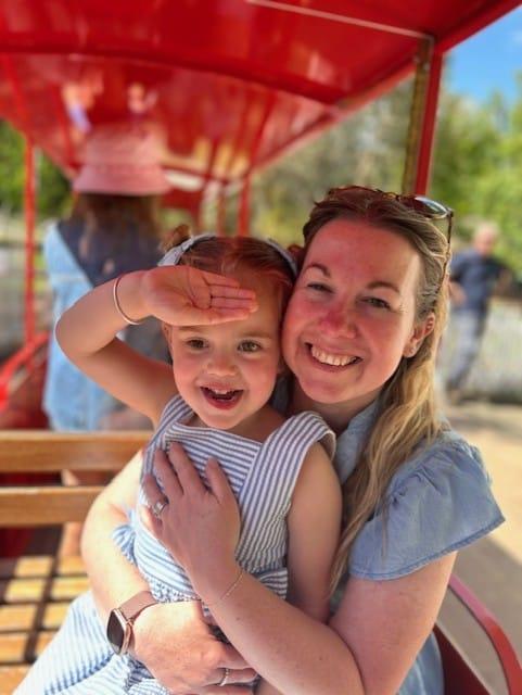Jessy at the fairground with her mum